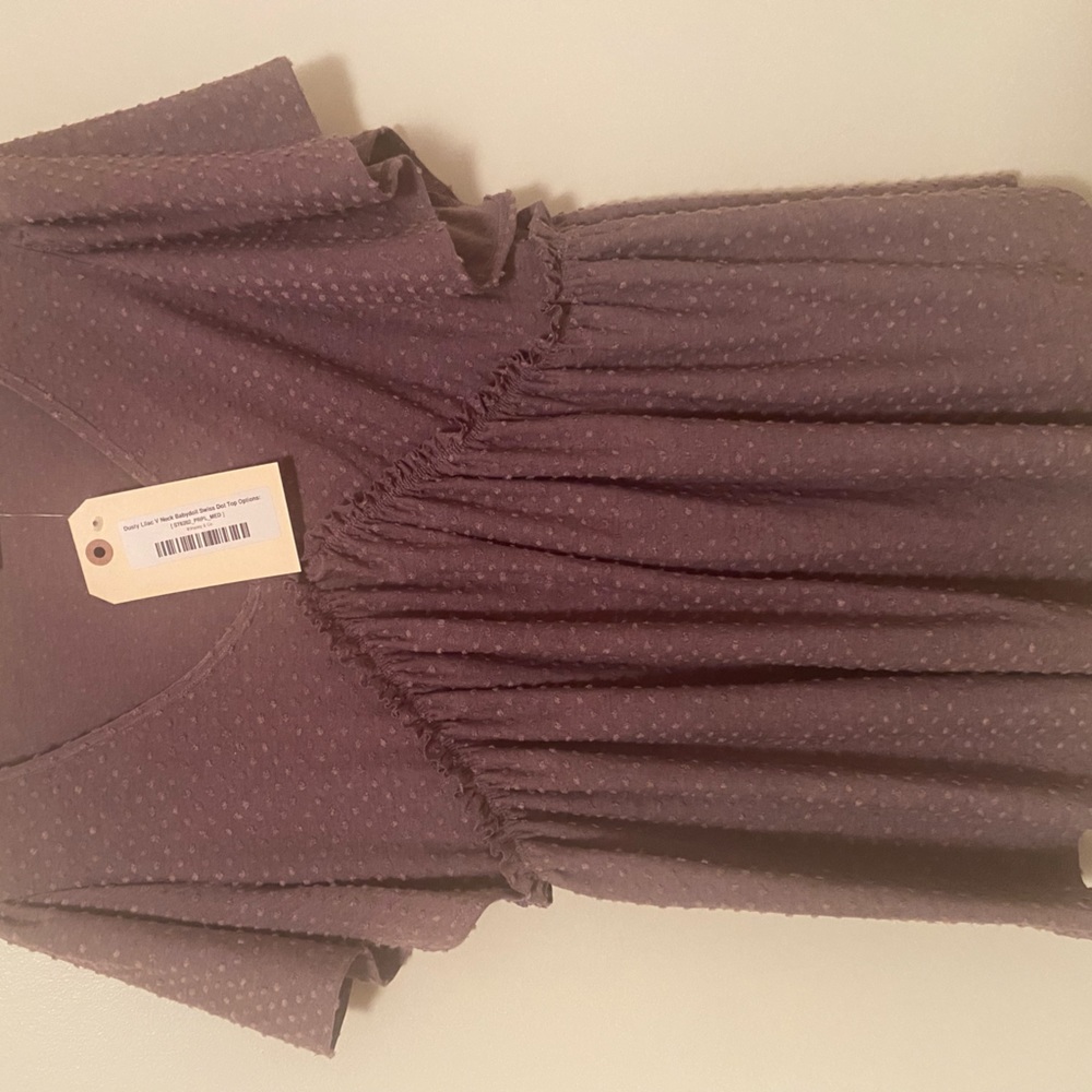 Lilac v neck babydoll top size medium never worn.
